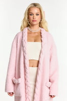 Pink Elsa coat by Nana Jacqueline, stylish and warm outerwear featuring a tailored design and elegant fabric.
