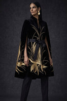 Nadya Shah Cape Solaris in Noir, stylish black jacket with elegant design, shown on a model against a neutral background.