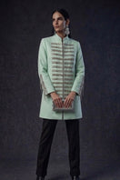 Nadya Shah Azurra Mint Coat in soft mint green, stylish long coat with tailored fit and button details, front view.