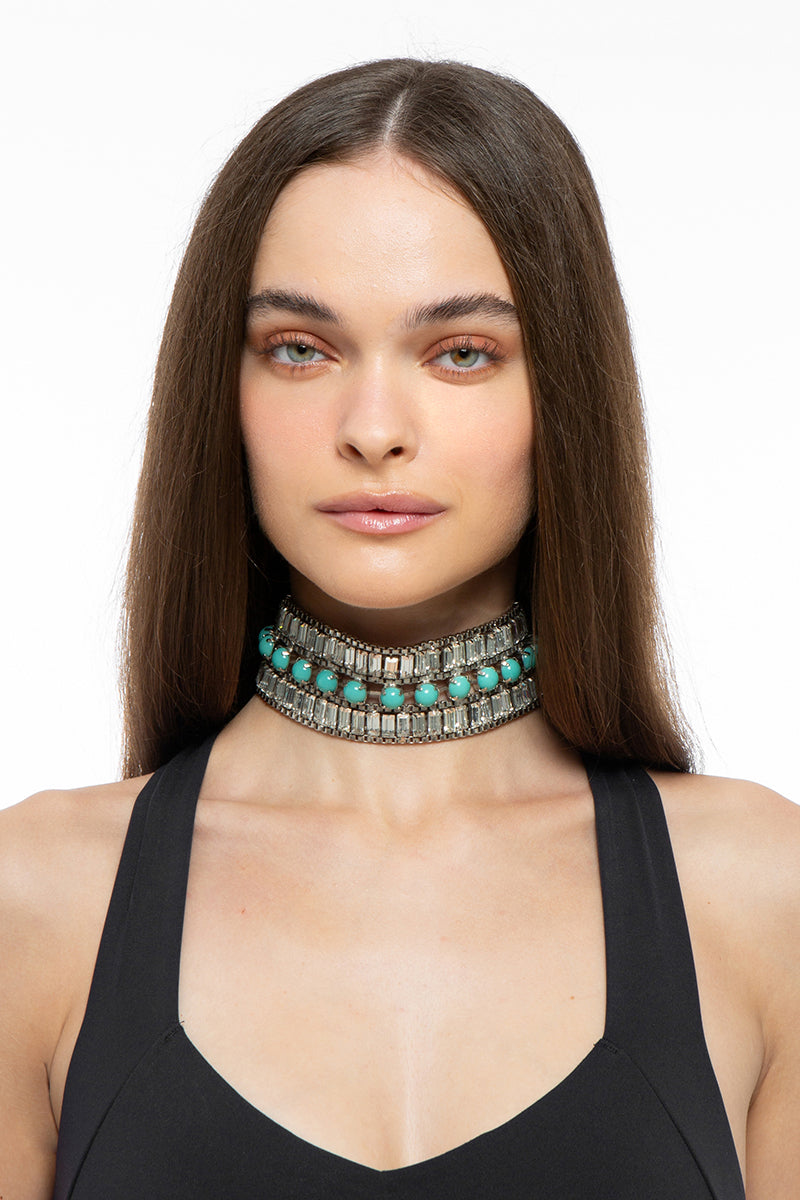 Silvia Gnecchi Shania Necklace featuring a delicate chain and elegant pendant, displayed on a neutral background.