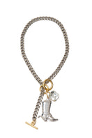 Silvia Gnecchi Debut Necklace featuring a delicate chain and elegant pendant, displayed on a white background.