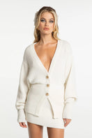 Nana Jacqueline LIZA cardigan in soft knit, featuring a relaxed fit and button closure, displayed on a neutral background.