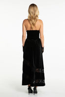Nana Jacqueline Maxine velvet gown in rich fabric, featuring elegant draping and a sophisticated silhouette, showcased on a model.