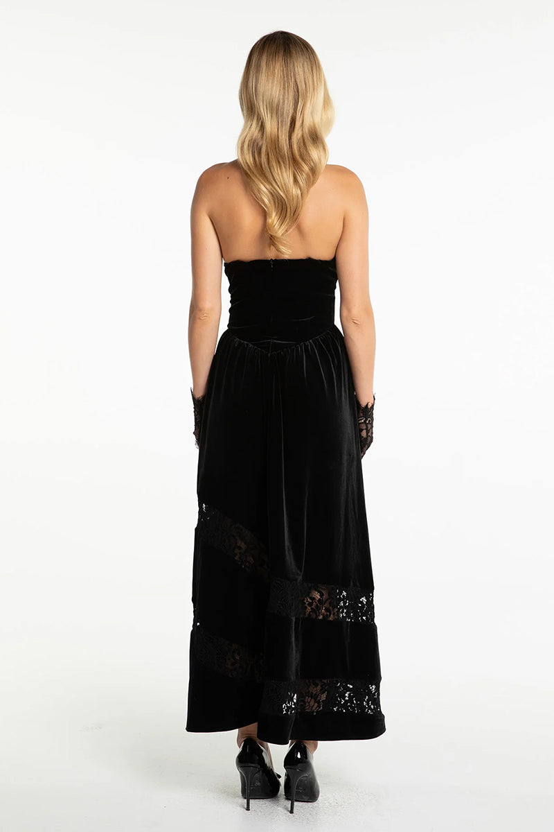 Nana Jacqueline Maxine velvet gown in rich fabric, featuring elegant draping and a sophisticated silhouette, showcased on a model.