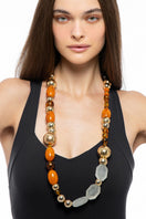Silvia Gnecchi Coralie long necklace featuring delicate chain and elegant pendant, perfect for stylish layered look.