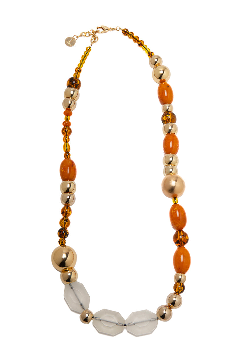 Silvia Gnecchi Coralie long necklace featuring layered gold chains with delicate pendant details.