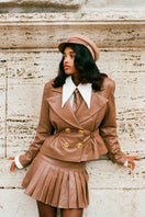 Nana Jacqueline Gina jacket, stylish women's jacket in a sleek design, displayed on a hanger with a neutral background.
