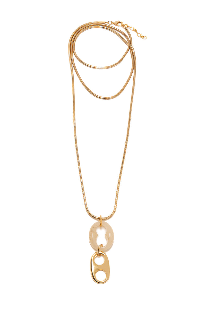 Silvia Gnecchi Bella in Gold and Rice color necklace featuring delicate gold chain and rice-shaped pendant.