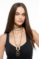 Silvia Gnecchi Bella in Gold and Rice color necklace featuring elegant chain and minimalist pendant design.