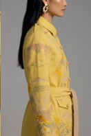 Nadya Shah ESME cargo jacket in primrose color, shown with multiple pockets and a relaxed fit on a model.