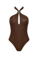 Maliluha Voyage one-piece swimsuit in brown, showcasing a sleek design and comfortable fit on a model.