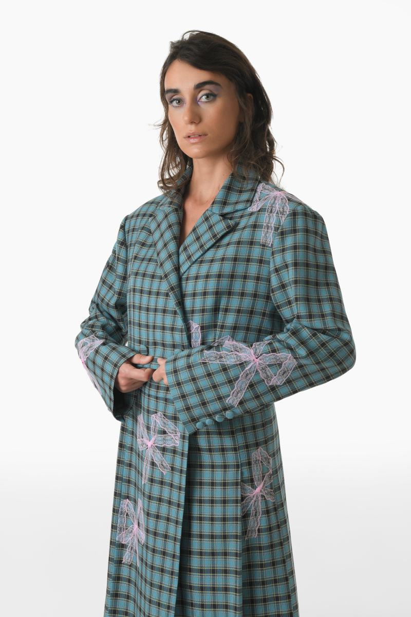 Gvasalia teal and pink double-breasted cropped blazer with bow tie, stylish jacket with tailored fit and vibrant color contrast.