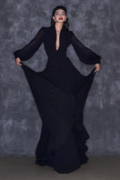 Black chiffon maxi gown with puffed sleeves and a corset-style bodice by CEM, elegant and flowing formal dress.
