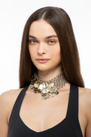 Silver and gold Candelaria necklace by Silvia Gnecchi featuring intricate design and elegant craftsmanship.