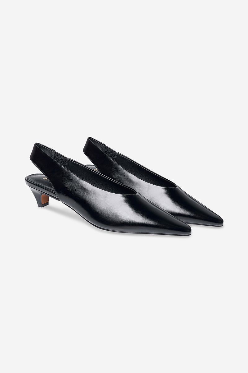 Black Downtown heels by 10th Floor featuring sleek design and pointed toe, perfect for stylish formal or evening wear.