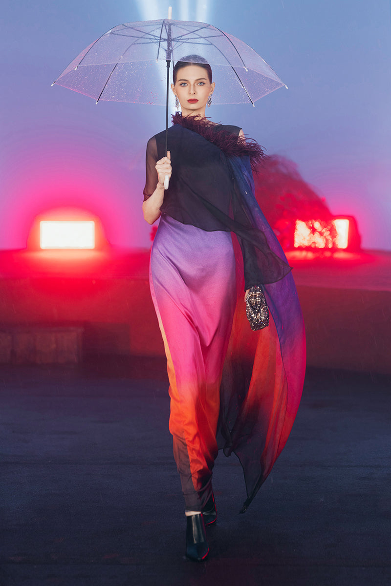 Pink printed gown with detachable ostrich feather trim cape by Valenciani, elegant evening dress with intricate details.