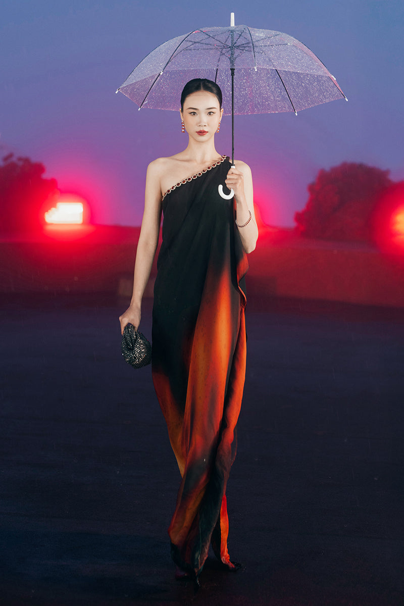 Beaded one-shoulder maxi dress by Valenciani featuring intricate beadwork and elegant flowing fabric.