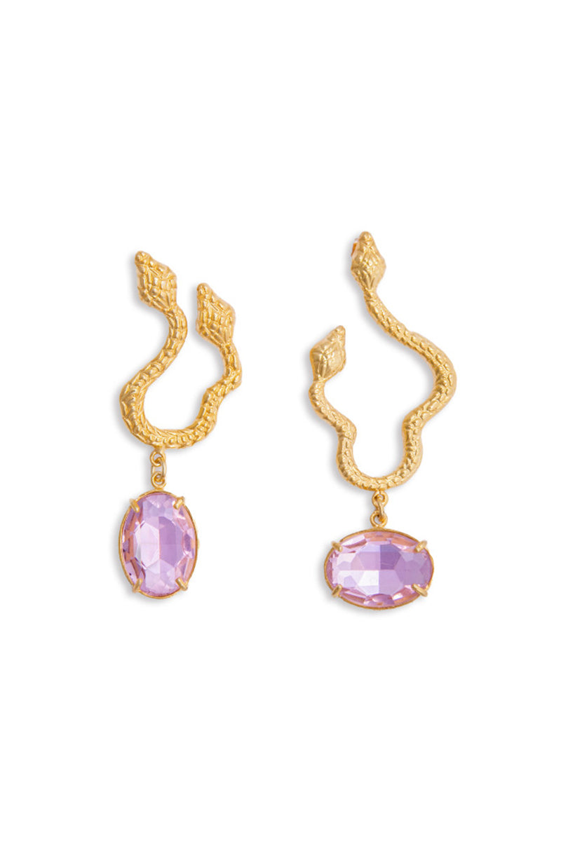Asymmetric snake earrings by Natia x Lako featuring light pink crystal accents, showcasing a modern, stylish jewelry design.