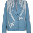Nadya Shah Skyelar denim blouson in powder-blue denim jacket with relaxed fit and classic collar, shown on a hanger.