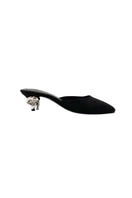 Black YASSMIN SALEH Orbit heels featuring sleek design and pointed toes, displayed on a neutral background.