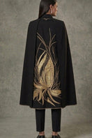 Nadya Shah Cape Solaris in Noir jacket with sleek black design, lightweight fabric, and modern urban style.