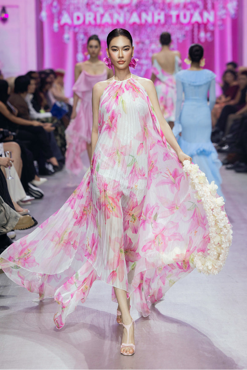 Valenciani halter neck pleated maxi dress in multicolor, flowing design with a fitted bodice and full-length skirt.