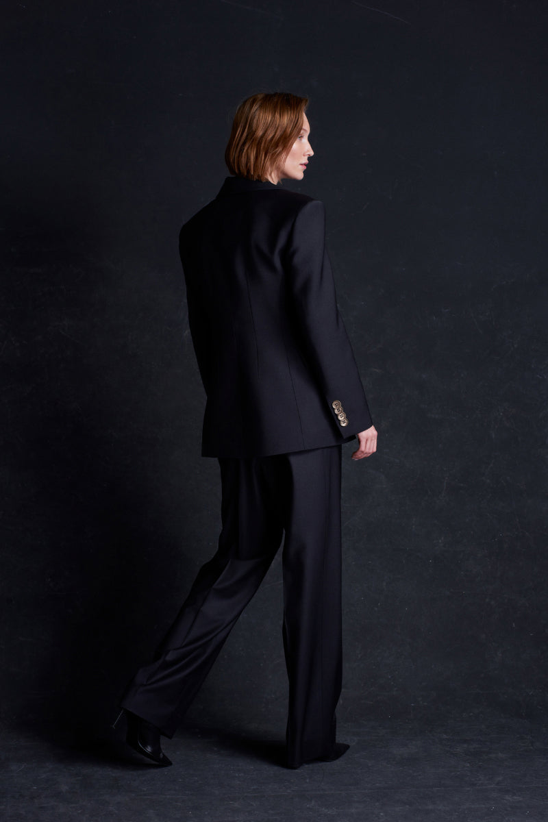 Black Earth Blazer jacket by Acaria Studio, shown in a stylish fit with tailored details and a sleek, modern design.