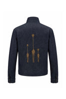 Nadya Shah Zahara denim jacket in indigo, featuring classic design with front pockets and button closures, displayed on a hanger.