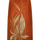 Nadya Shah Cape Solaris in Solar Amber jacket showcasing a stylish, lightweight design with warm solar amber color.