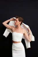 White Ancient Crop Blazer by Acaria Studio, stylish jacket with modern design and tailored fit, displayed on a neutral background.