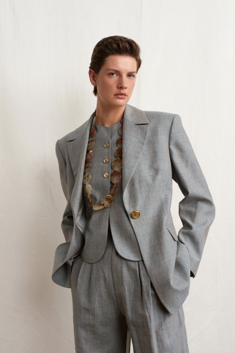 Green melange linen blazer by Acaria Studio, stylish lightweight jacket with tailored fit and classic lapel design.