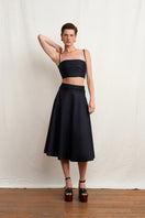 Black WISSY top by Acaria Studio, featuring a stylish, fitted design perfect for casual or dressy occasions.