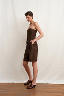 Brown Acaria Studio Guru Top shown on a model, featuring a stylish, fitted design perfect for casual or semi-formal wear.