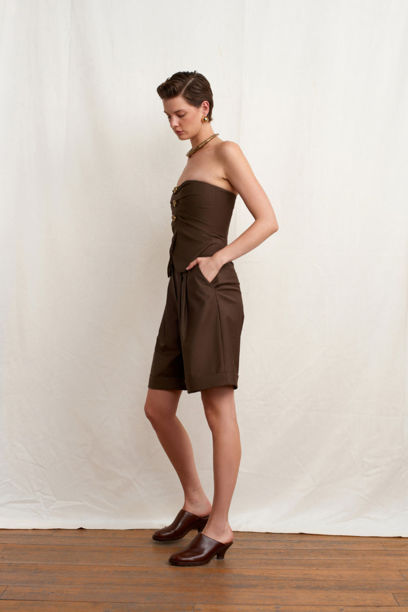Brown Acaria Studio Guru Top shown on a model, featuring a stylish, fitted design perfect for casual or semi-formal wear.