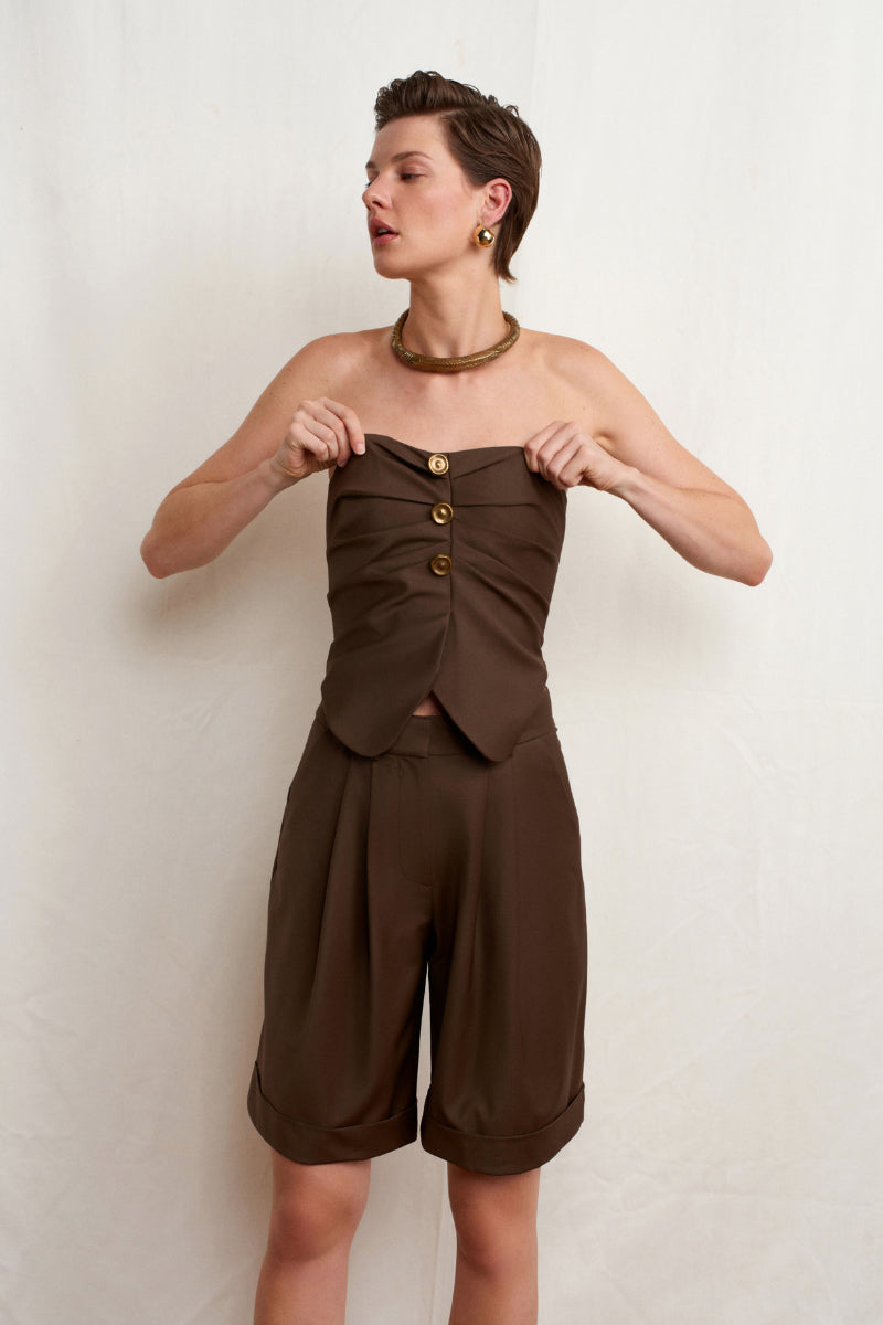 Acaria Studio brown top featuring a stylish design, displayed on a model showcasing the fashionable women's tops collection.
