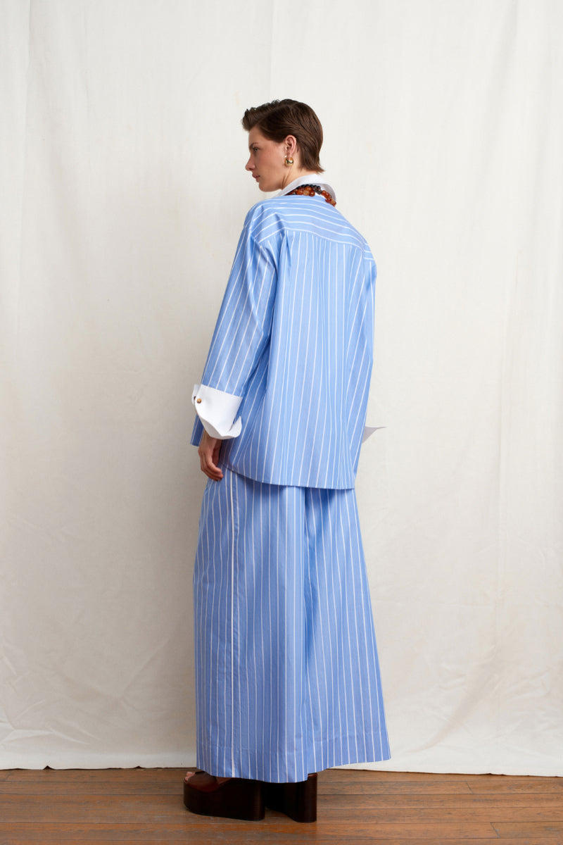 Blue SOULMATE shirt by Acaria Studio, showing a stylish button-up design with collar and long sleeves.