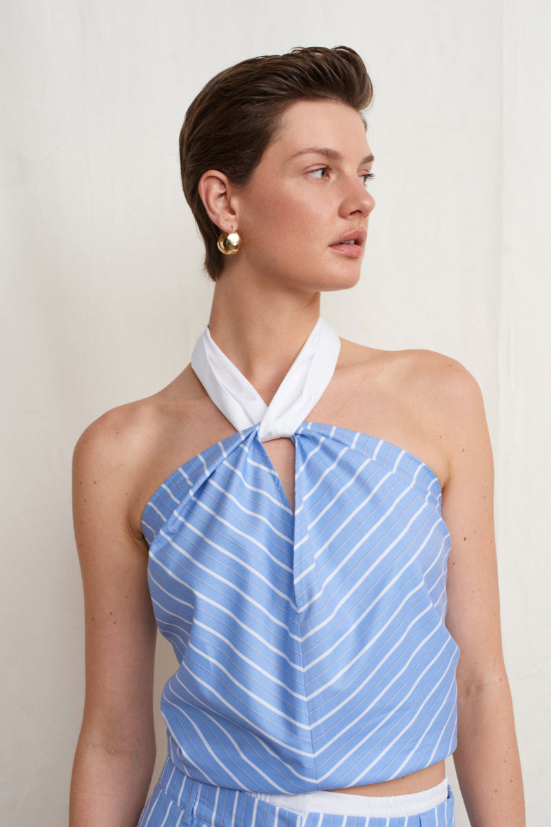 Blue Acaria Studio Soul Top, stylish women's fashion top featuring a modern design, displayed on a hanger.
