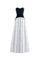 Elegant black and white strapless gown by Happy Clothing, flowing fabric and classic design, perfect for formal occasions.
