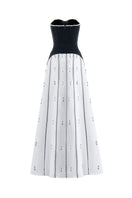 Black and white strapless gown by Happy Clothing, flowing fabric with elegant design, perfect for formal occasions.