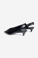 Black Downtown heels by 10th Floor featuring sleek pointed toes and stiletto heels on a neutral background.
