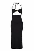Black ETE MAXI SKIRT by Maliluha featuring a flowing fabric and elegant design, shown on a hanger against a neutral background.