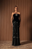 Embroided noir velvet gown by Monika Dimova featuring intricate embroidery and elegant design, shown on a model.