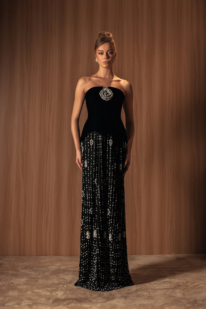 Embroided noir velvet gown by Monika Dimova featuring intricate embroidery and elegant design, shown on a model.