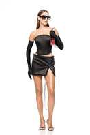 Black Roxanne corset top by Matters, featuring structured design and lace-up front, styled on a model.