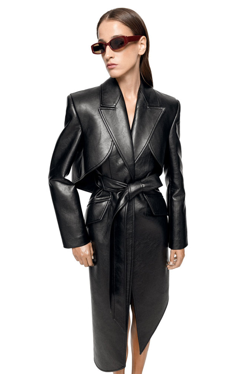 Matters Reign black trench coat hanging on a wooden hanger, showcasing sleek design and classic style.