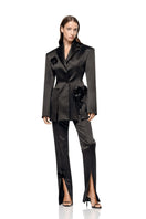 Matters Fleur black trousers, stylish pants with a tailored fit and elegant design, shown on a model.