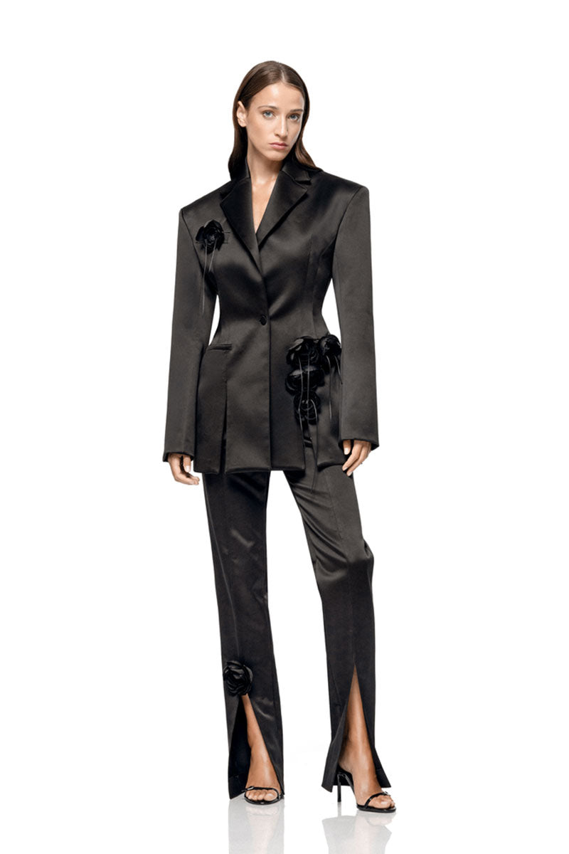 Matters Fleur black trousers, stylish pants with a tailored fit and elegant design, shown on a model.