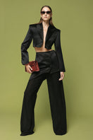 Matters LIV black blazer, tailored men's blazer with a sleek fit and classic lapel, shown on a hanger.