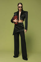 Matters LIV detachable black trousers, stylish pants with adjustable features, shown on a model revealing their modern design.