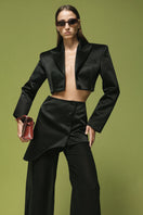Matters LIV black blazer displayed on a hanger, showcasing a tailored fit and classic design for stylish professional wear.